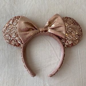Rose gold Disney Minnie Mouse ears.